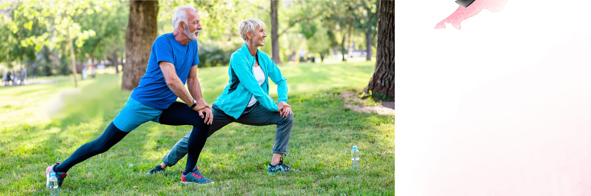 Elderly couple stays healthy and active by practices yoga together outside in a park